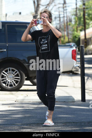 Kaley Cuoco takes pictures with her cell phone  Featuring: Kaley Cuoco Where: Los Angeles, California, United States When: 16 Mar 2016 Stock Photo