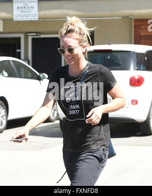 Kaley Cuoco takes pictures with her cell phone  Featuring: Kaley Cuoco Where: Los Angeles, California, United States When: 16 Mar 2016 Stock Photo