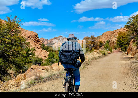 Bike Rider with backpack on trail  in Prescott, Arizona USA Stock Photo