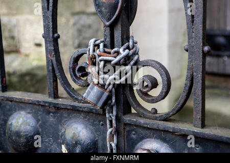 Padlocked and chained gates Stock Photo