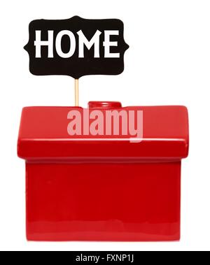 Red house with home sign Stock Photo