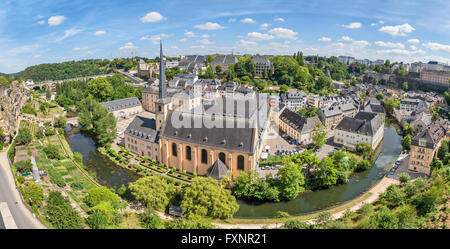 Panoramic aerial view on bend of Alzette river and church of St Jean du Grund in Luxembourg City Stock Photo
