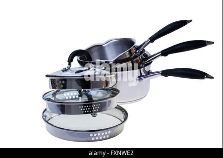 Three stainless steel saucepans and glass topped lids. Stock Photo