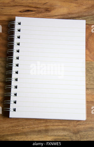 empty notebook on wooden background Stock Photo