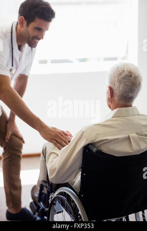 Nurse taking care of a senior man Stock Photo