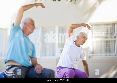 Senior couple doing exercises Stock Photo