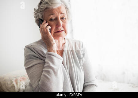 Senior woman talking on the phone Stock Photo