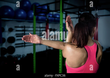 Woman stretching her arms Stock Photo