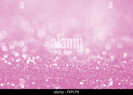 Pink glitter surface with pink light bokeh - It can be used for background for special occasions promotion campaign or product d Stock Photo