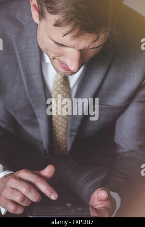 Businessman using digital tablet Stock Photo