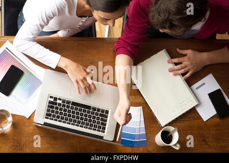 Team members collaborating on project Stock Photo