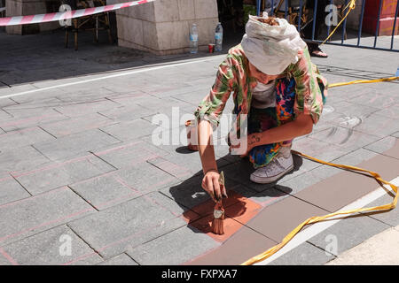 Jerusalem, Israel. 17th April, 2016. Italian artist, FRANCESCA ARSI, prepares a three dimensional painting in the framework of Perspectives, an exhibition of 3-D artworks by international and Israeli artists along the streets of downtown Jerusalem. Exhibition opens 24th April, 2016. Credit:  Nir Alon/Alamy Live News Stock Photo