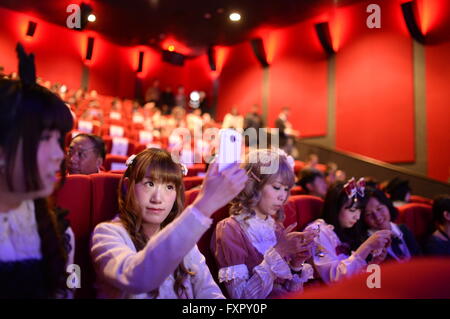 Beijing, China. 17th Apr, 2016. Movie fans take selfies at the opening ceremony of Japanese Film Week in Beijing, capital of China, April 17, 2016. Japanese Film Week, part of the 6th Beijing International Film Festival lasting from April 16 to April 23, kicked off here Sunday. © Zhou Mi/Xinhua/Alamy Live News Stock Photo