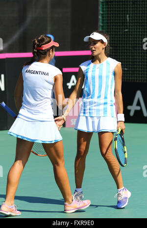 Kyiv, Ukraine. 17th April, 2016. Guadalupe Perez Rojas (L) and Maria Lourdes Carle of Argentina in action during BNP Paribas FedCup World Group II Play-off pair game against Ukraine at Campa Bucha Tennis Club in Kyiv, Ukraine. Ukraine won pair game 6-1, 6-3. Credit:  Oleksandr Prykhodko/Alamy Live News Stock Photo