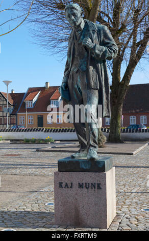 Statue of Kaj Munk, the Danish poet-pastor and playwright known for his cultural engagement and martyrdom during World War II. The town square. Stock Photo