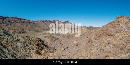 Landscape around Teide volcano: petrified lava flows and sharp volcanic rocks resemble the Moon. Mount Teide, Tenerife. Stock Photo