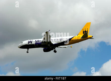Monarch Airbus A320 landing at Birmingham Airport, UK (G-OZBY) Stock Photo