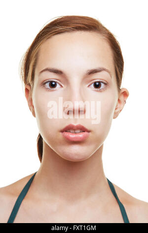 Young woman with blank expression on her face Stock Photo