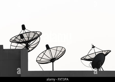 satellite dishes on top of the building Stock Photo