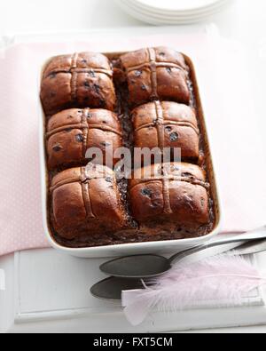 Overhead view of hot cross chocolate bread and butter pudding in baking tin Stock Photo