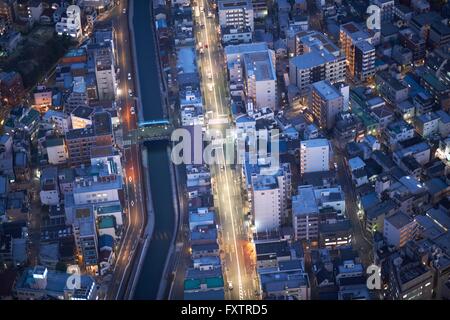 Overhead view of city and highways at night, Tokyo, Japan Stock Photo