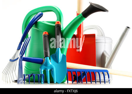 Watering can and garden tools isolated on white background Stock Photo