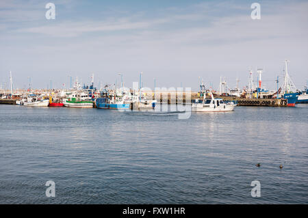 Fishing vessels on water at Szkuner harbour in Wladyslawowo, Poland, Europe. Moored ships in a Schooner fishing docks. Stock Photo