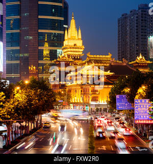 Jing'an Temple is a Buddhist temple on the West Nanjing Road in Shanghai, China. Stock Photo