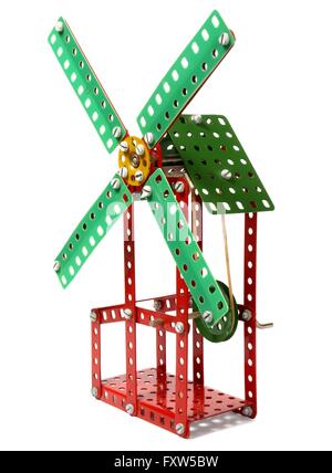 Old metal toy windmill isolated on white background Stock Photo