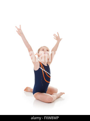 Young girl gymnast in various poses, isolated on white. Stock Photo