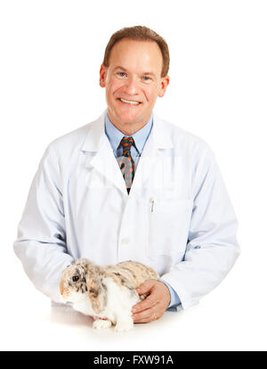 Series with a Cacucasian Veterinarian, and mixed-ethnicity group of assistants and customers.  Holding rabbit, cat and dog.  Iso Stock Photo