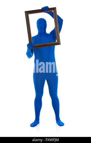 Series with a man dressed in a blue bodysuit or morphsuit.  Isolated on white background.  Good for situations where an anonymou Stock Photo