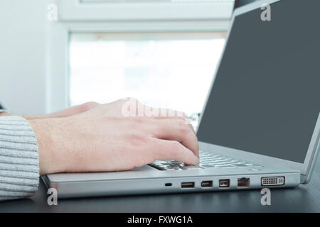 Hands and laptop Stock Photo