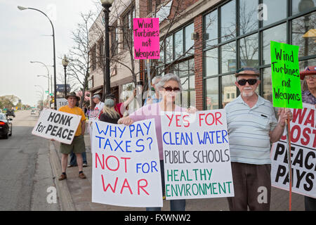 Ferndale, Michigan, USA. 18th April 2016. Protesters gather at the income tax filing deadline to call for peaceful uses of tax dollars, such as education or clean energy, instead of weapons of war. Credit:  Jim West/Alamy Live News Stock Photo