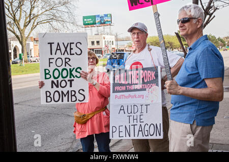 Ferndale, Michigan, USA. 18th April 2016. Protesters gather at the income tax filing deadline to call for peaceful uses of tax dollars, such as education or clean energy, instead of weapons of war. Credit:  Jim West/Alamy Live News Stock Photo