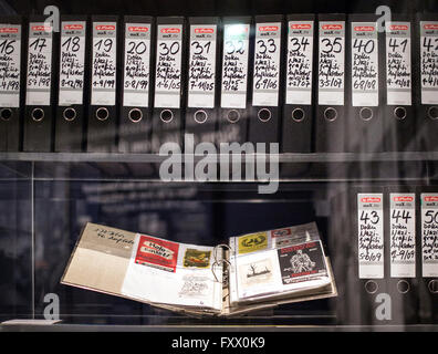 Berlin, Germany. 19th Apr, 2016. Numerous files with Nazi stickers standing in a showcase at the exhibition 'Angezettelt - Anti-Semitic and Racist Stickers from 1880 Until Today' in Berlin, Germany, 19 April 2016. The exhibition can be seen from 20 April until 31 July 2016 at the German Historical Museum. PHOTO: SOPHIA KEMBOWSKI/dpa/Alamy Live News Stock Photo