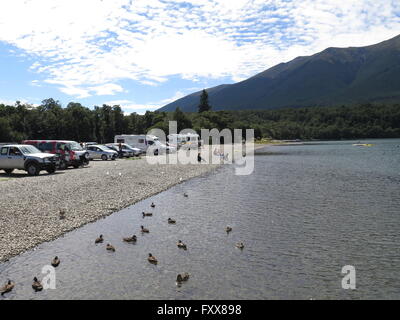 Cars overlooking Lake Rotoiti, Nelson Lakes National Park, New Zealand Stock Photo