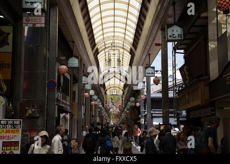 Crowds shopping on Sunday morning in Kyoto's covered Nishiki Market in Japan. Stock Photo