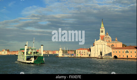 Venice, Isola di San Giorgio Maggiore Island, and Actv ferry Metamauco, IMO 9198434, on the way to Lido Stock Photo