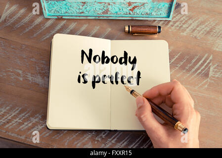 Handwritten quote Nobody is perfect as inspirational concept image Stock Photo