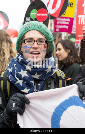 A nurse attends the anti-austerity march in London, protesting against cuts to nursing education. Stock Photo