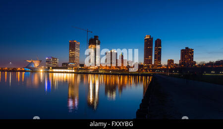 City of Milwaukee Wisconsin at Night lakefront ligts reflection in lake Michigan Stock Photo