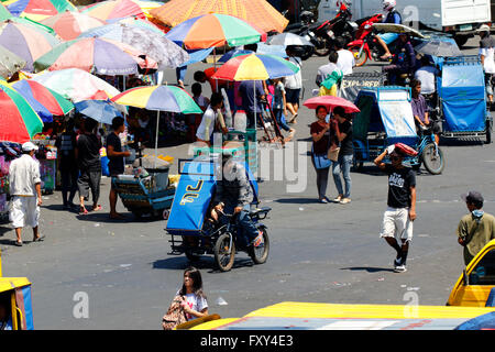 PEDAL TRIKES & PEDESTRIANS BACLARAN MANILA PHILIPPINES 05 May 2015 Stock Photo