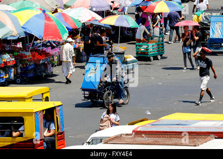 PEDAL TRIKES & PEDESTRIANS BACLARAN MANILA PHILIPPINES 05 May 2015 Stock Photo