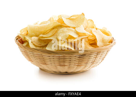 Crispy potato chips in a wicker bowl on white background Stock Photo