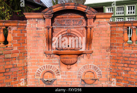 Remains of a terracotta brick drinking fountain, at  Burslem park Stoke On Trent  erected in 1894. Presented by Councilor Bowde Stock Photo