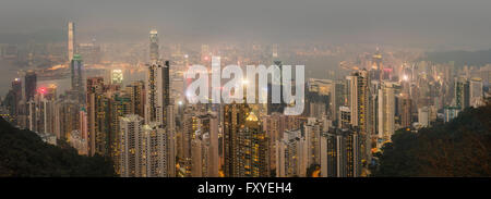 View over Hong Kong from Victoria Peak, the illuminated skyline of Central sits below The Peak, Victoria Peak, Hong Kong, China Stock Photo