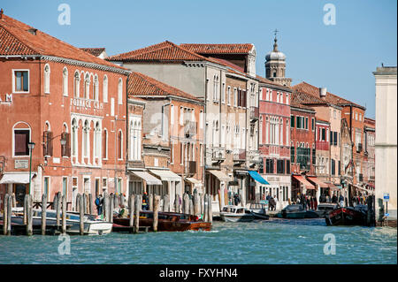 Row of houses along the canal in Murano, Venice, Veneto, Italy Stock Photo