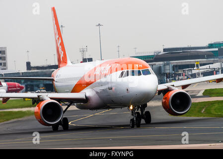 EasyJet Airline Airbus A320-214 Airliner G-EZTH Taxiing at Manchester International Airport England United Kingdom UK Stock Photo