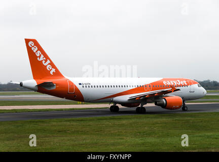 EasyJet Airline Airbus A320-214 Airliner G-EZTH Taxiing at Manchester International Airport England United Kingdom UK Stock Photo